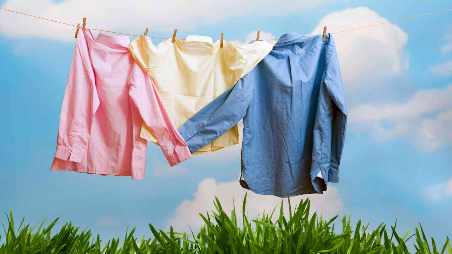 How to Make Laundry Smell Nice - Clothes hanging outdoors on clothing line